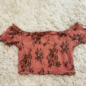 Small, super cute it is stretchy too :)